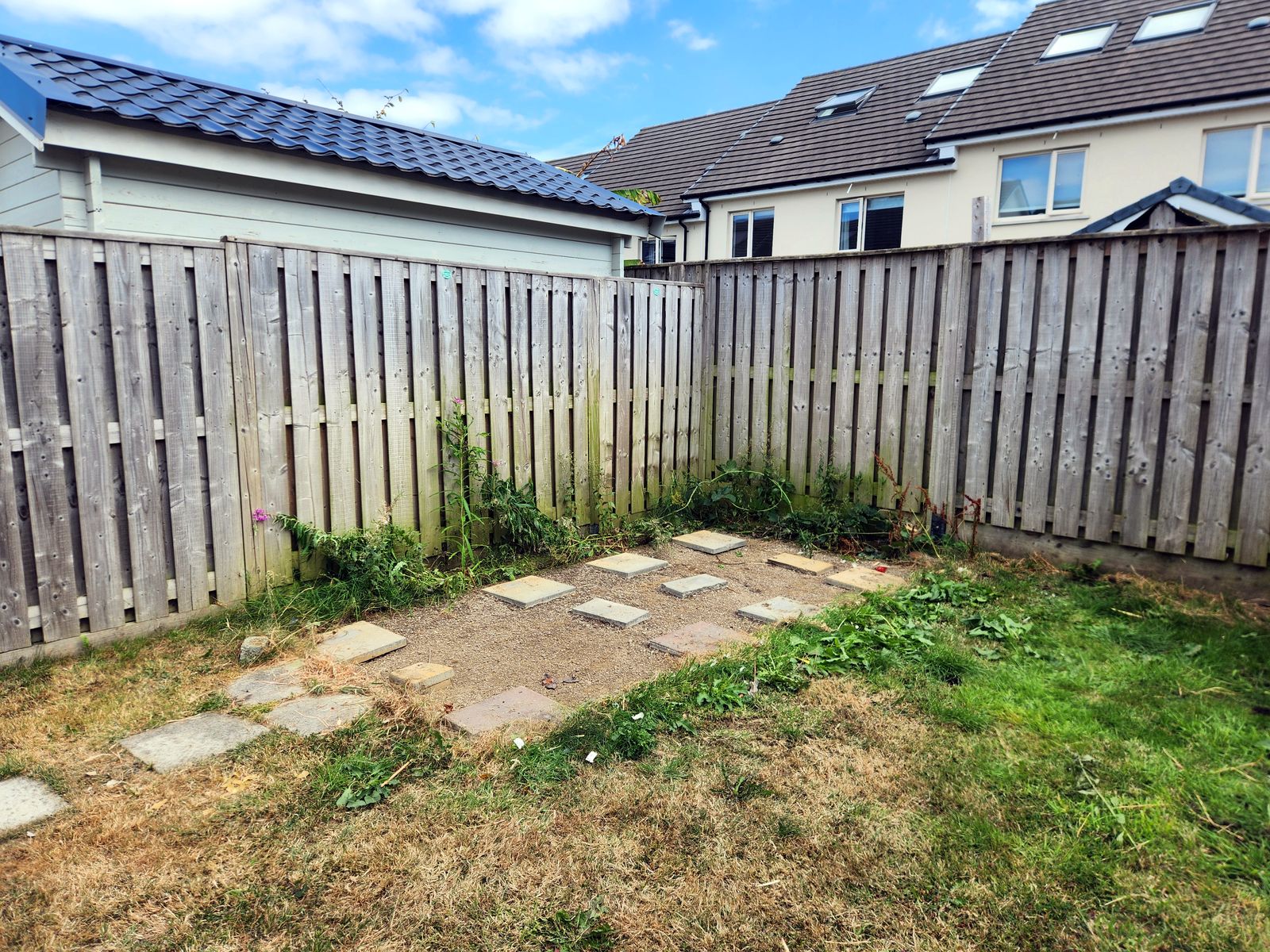 The same back garden with the shed completely removed
